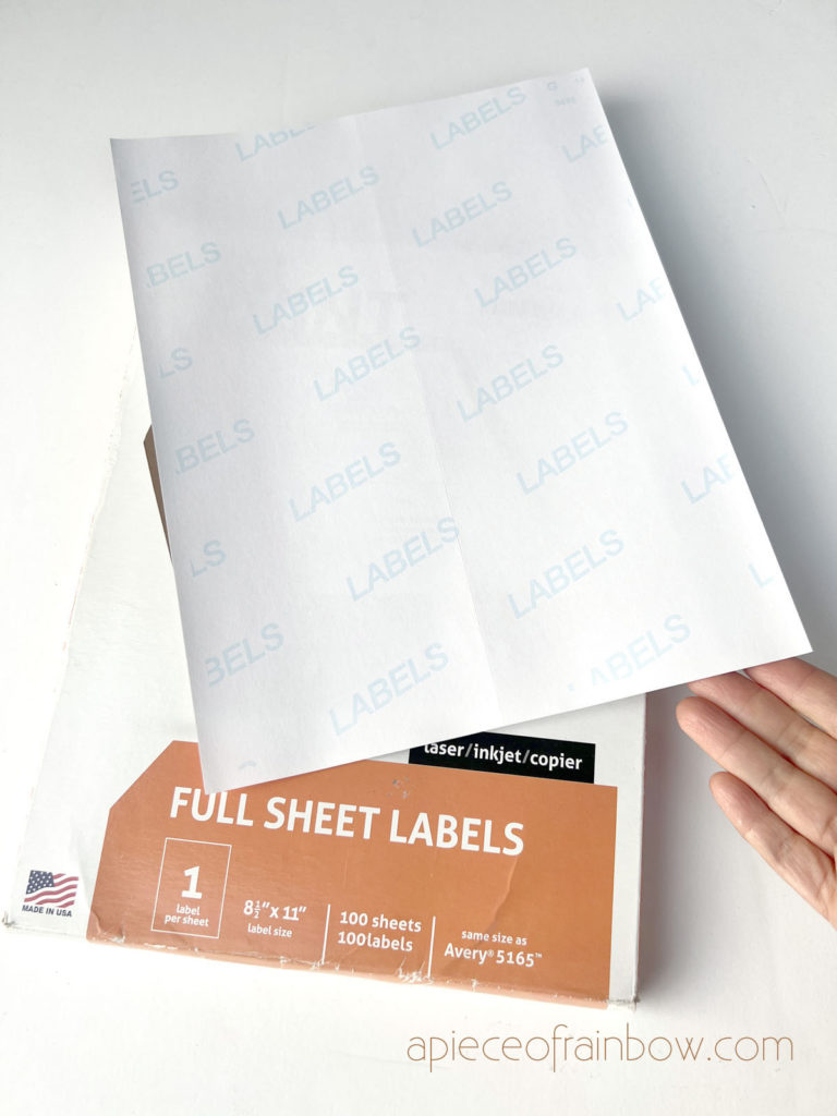 printing the image on the the backing sheet of a label.