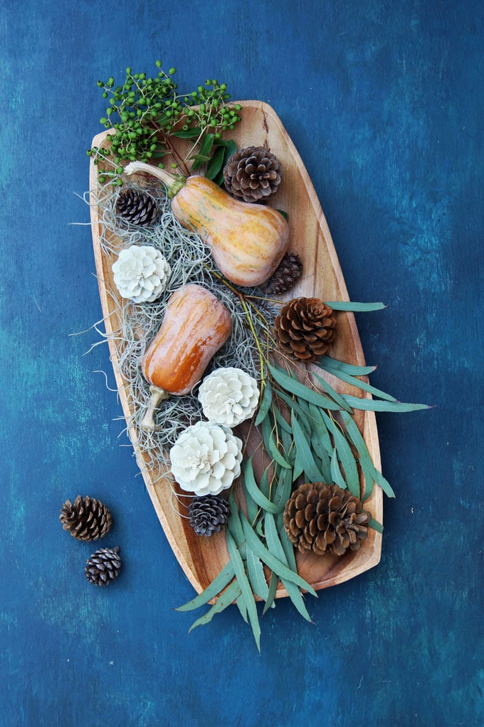 wood platter on blue: easy DIY Thanksgiving table decoration centerpiece