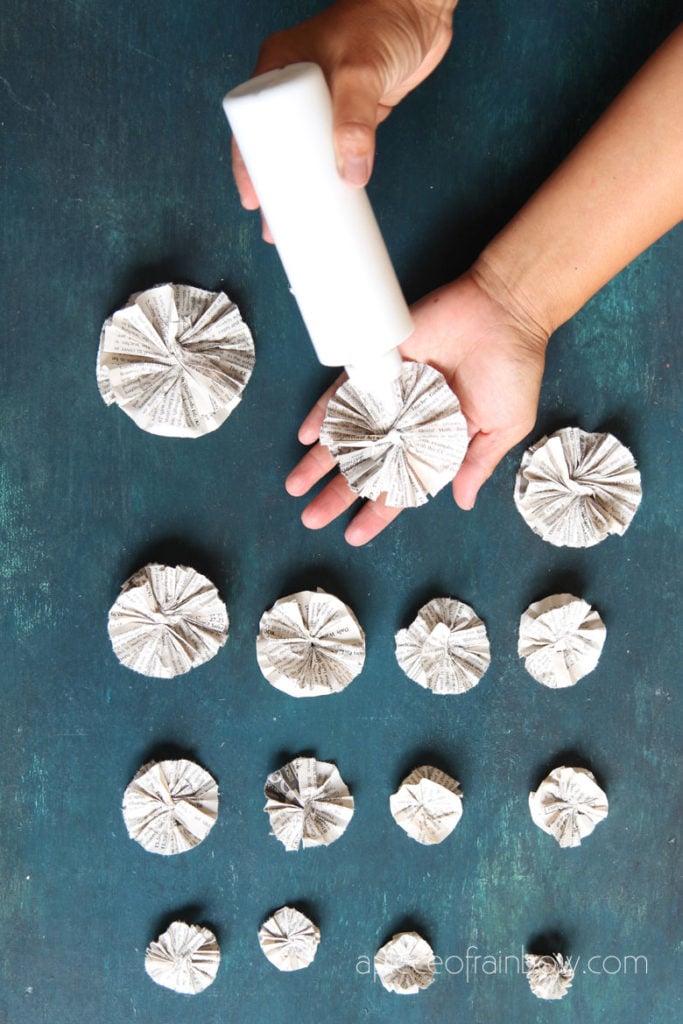 gluing  paper rosettes in a stack