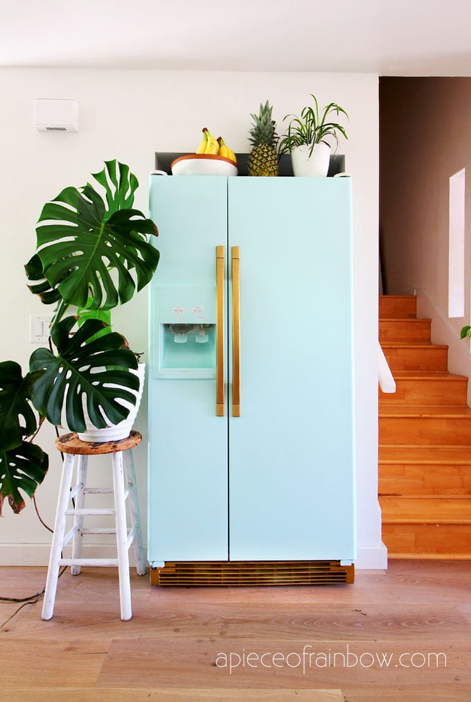 new bohemian style room with anthropologie style mint fridge inspired by SMEG fridge