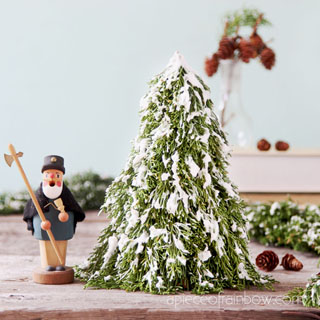 Make a tabletop snow flocked Christmas tree for almost free! Beautiful winter farmhouse decorations and easy crafts. Best DIY fake snow recipe!