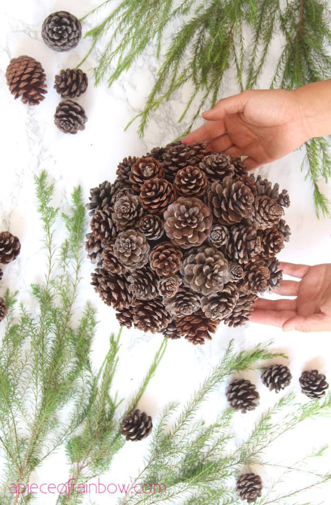 create a pine cone topiary table decoration
