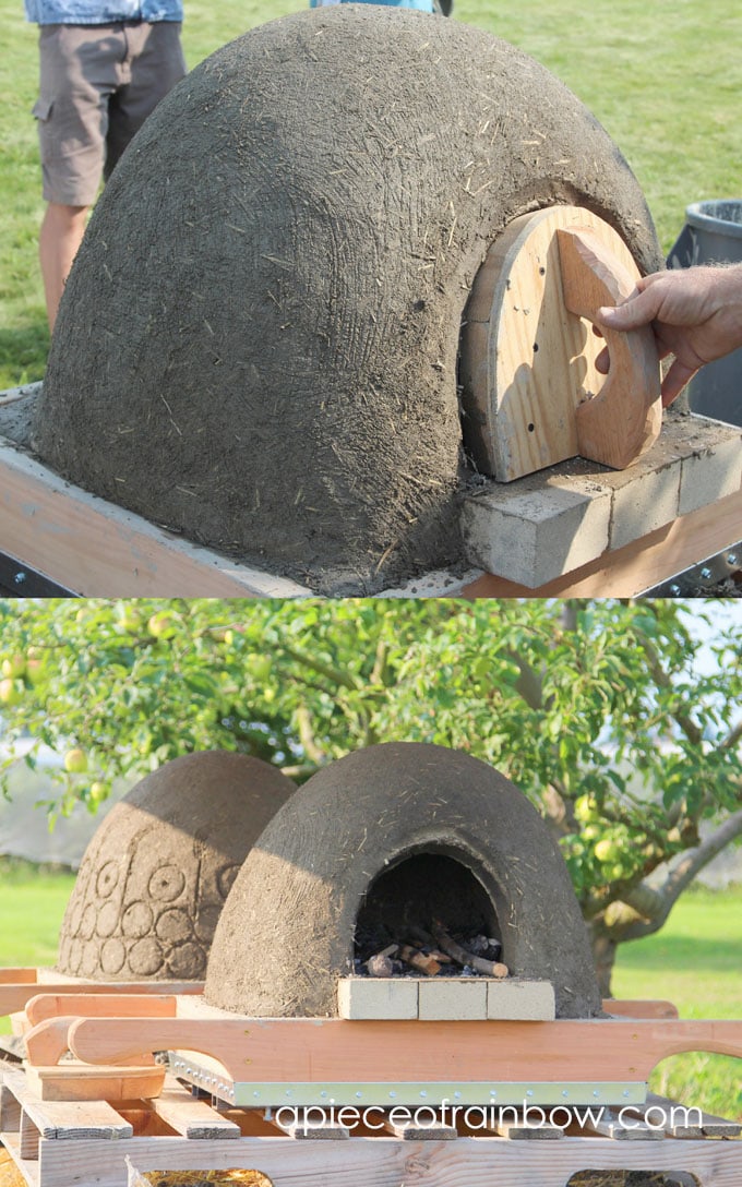 wood door on DIY wood fired outdoor pizza oven with simple low cost materials, aka cob / earth oven