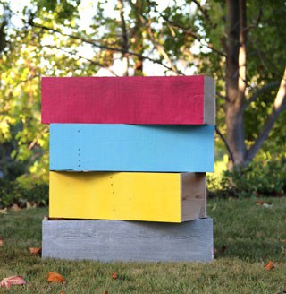 How to transform generic looking plastic planters into super chic wood planters, in just 30 minutes! | A Piece of Rainbow