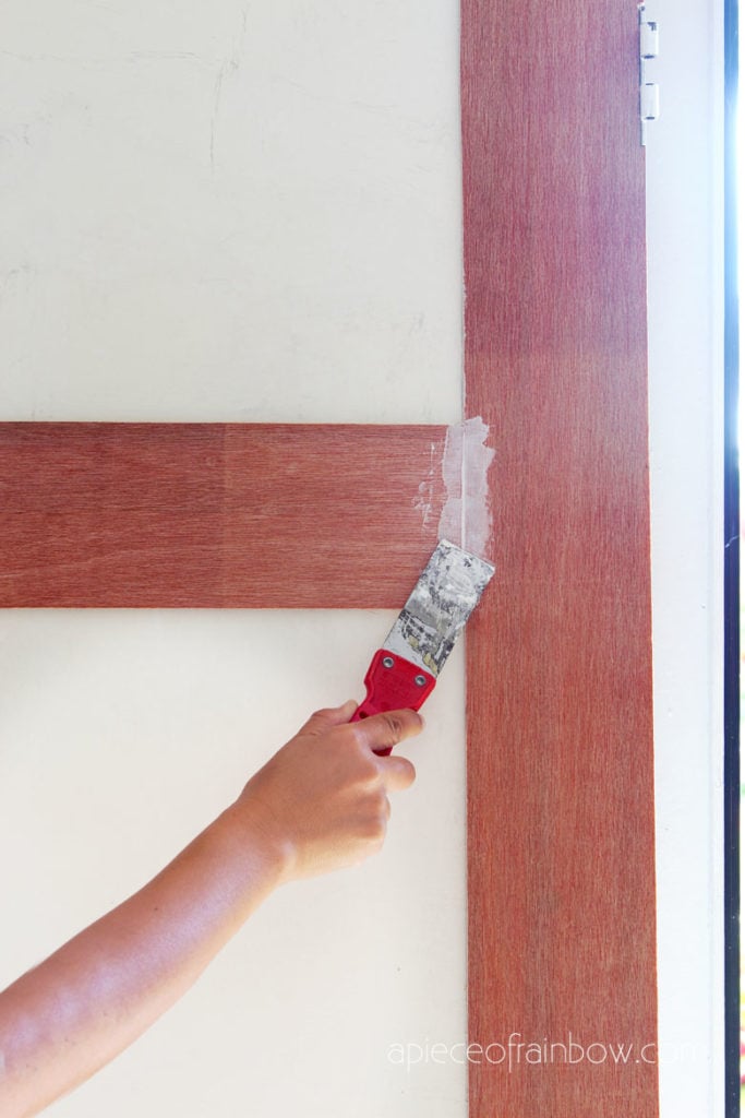 Use spackling paste or joint compound to smooth out any visible gaps.