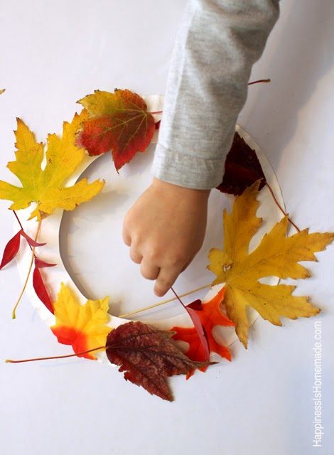 glue leaves to a cut paper plate to make a fall wreath