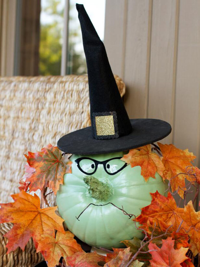 DIY Outdoor painted pumpkin Halloween porch decor