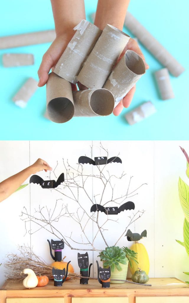 hanging halloween bats on branch as halloween decorations centerpiece