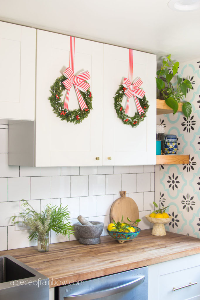 Anthropologie modern farmhouse Christmas kitchen decorations with DIY cabinet  wreaths