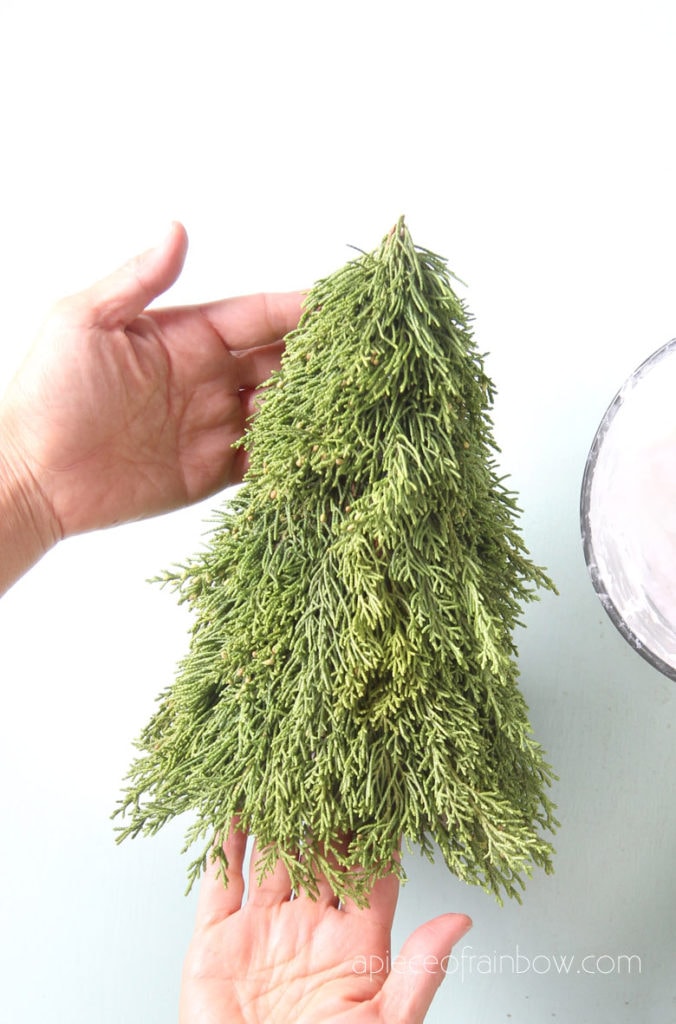 make a Christmas tree from real branches on a cone