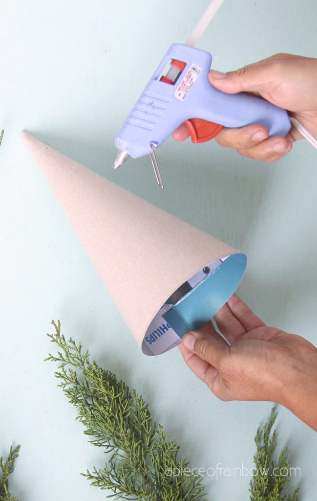 hot glue and a cardboard cone