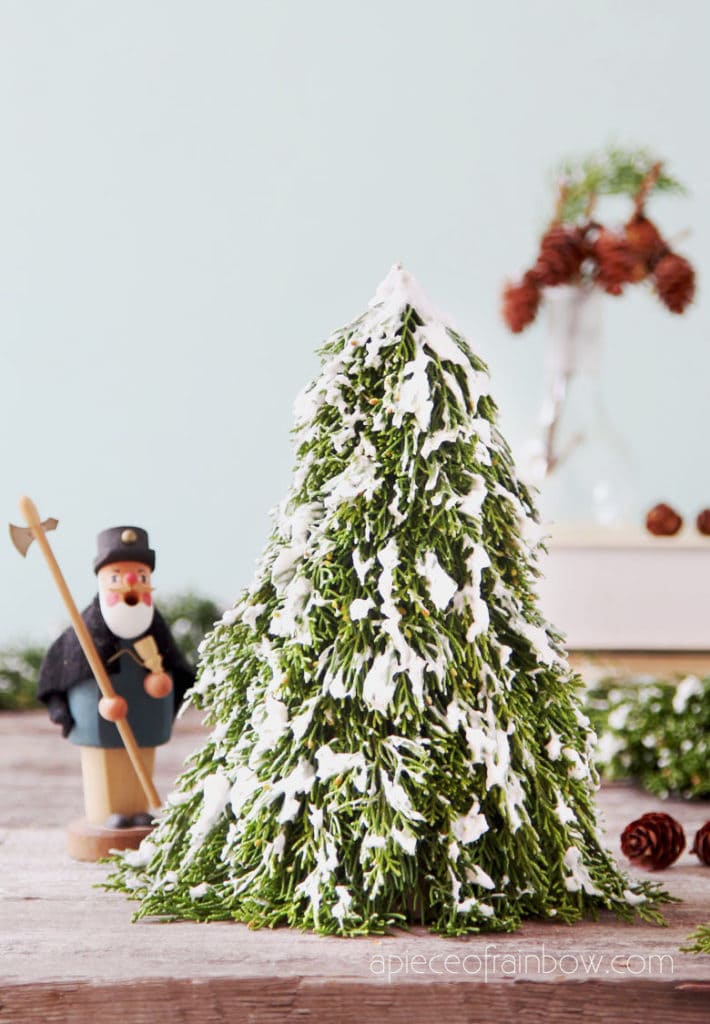 farmhouse  snow flocked Christmas tree, beautiful winter decorations