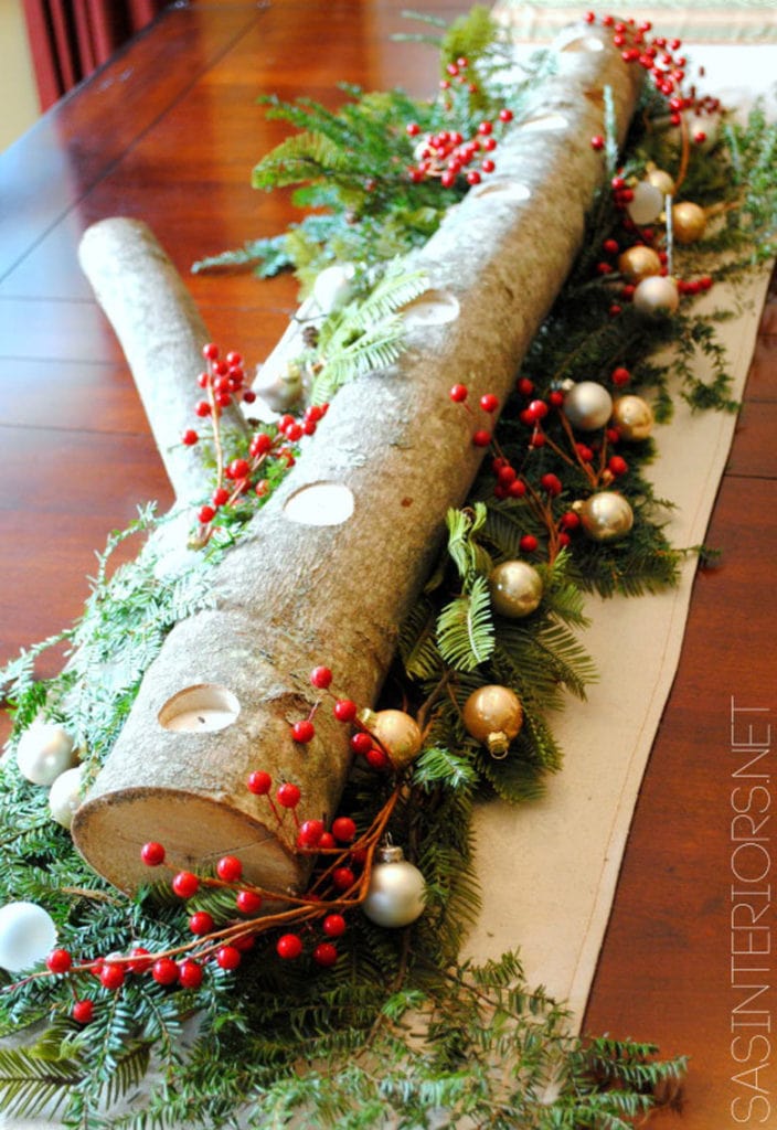 Make a Christmas table centerpiece with candles and a DIY log candle holder