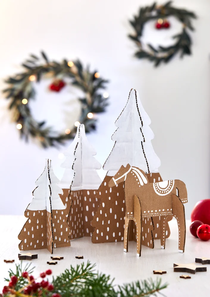 Winter Forest with animals and trees made from cardboard