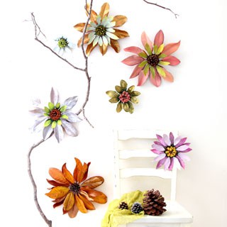 How to make flowers from nature walk findings such as pine cones and leaves. These giant blossoms make such dramatic, beautiful and free home decorations! via A Piece Of Rainbow