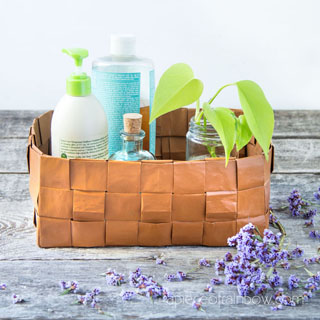 Beautiful DIY paper basket from recycled paper bags, & a secret to make paper look like leather! Easy basket weaving paper craft, boho farmhouse home decor & creative storage.
