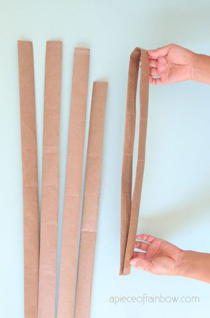 Fold thick paper strips for paper basket weaving